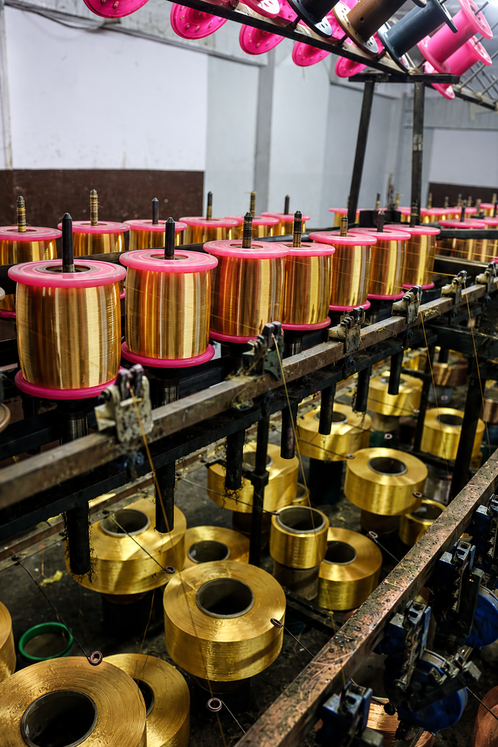 Jari cones prepared for embroidery units.